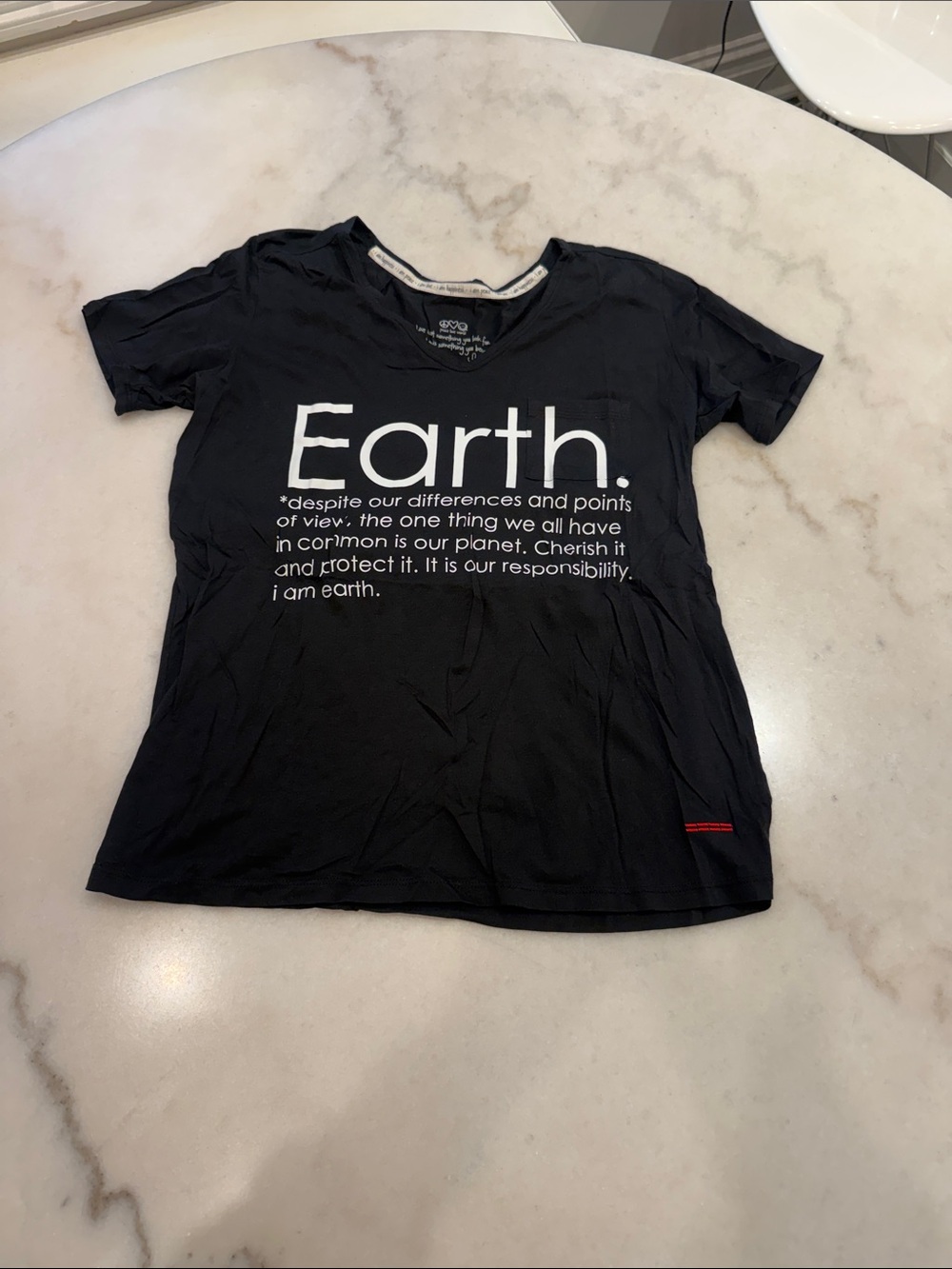 Peace Love World Black Tee with White "Earth." Print